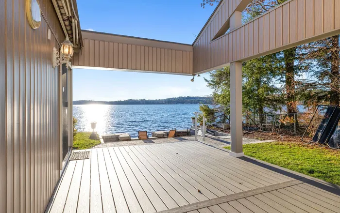 Covered waterfront patio and deck looking out over open water, the kind of Essex, MD hardscape we repair