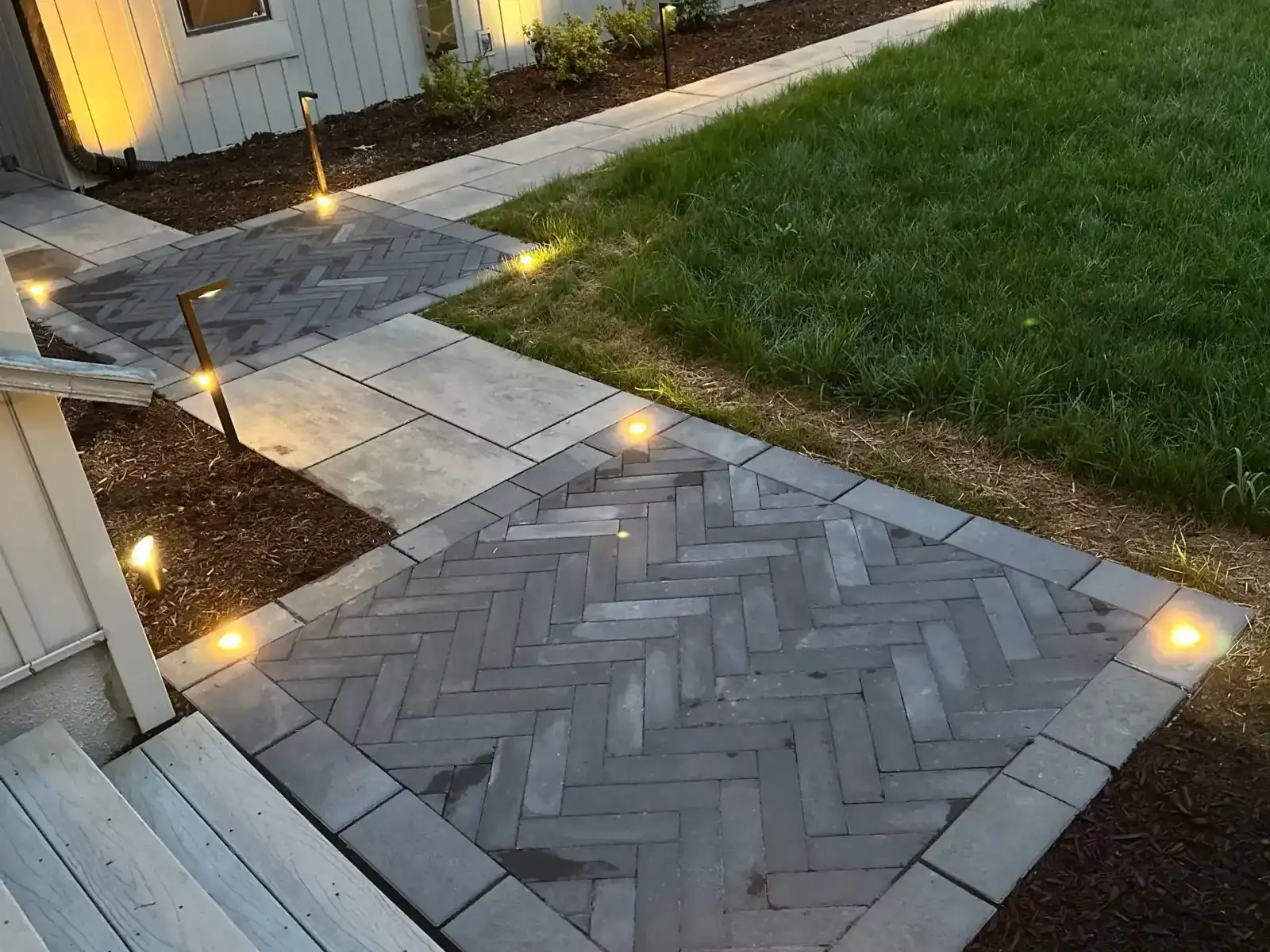 Herringbone paver walkway step lights