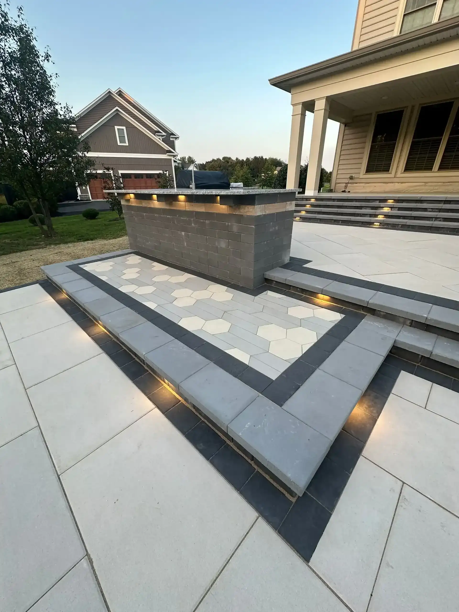 Paver patio hexagon inlay step lights
