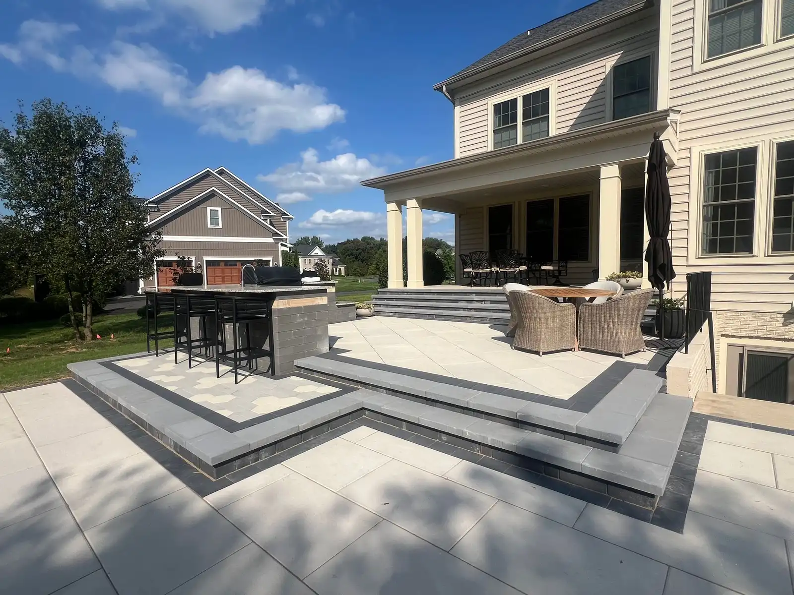 Porcelain paver patio outdoor bar steps