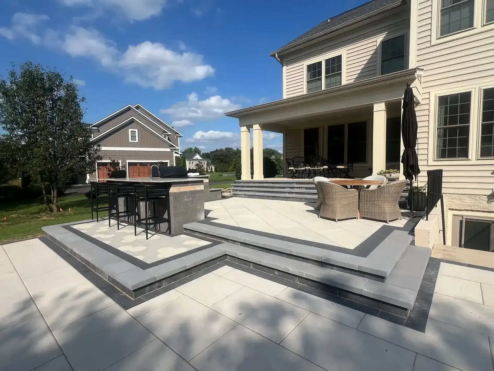 Porcelain paver patio outdoor bar steps